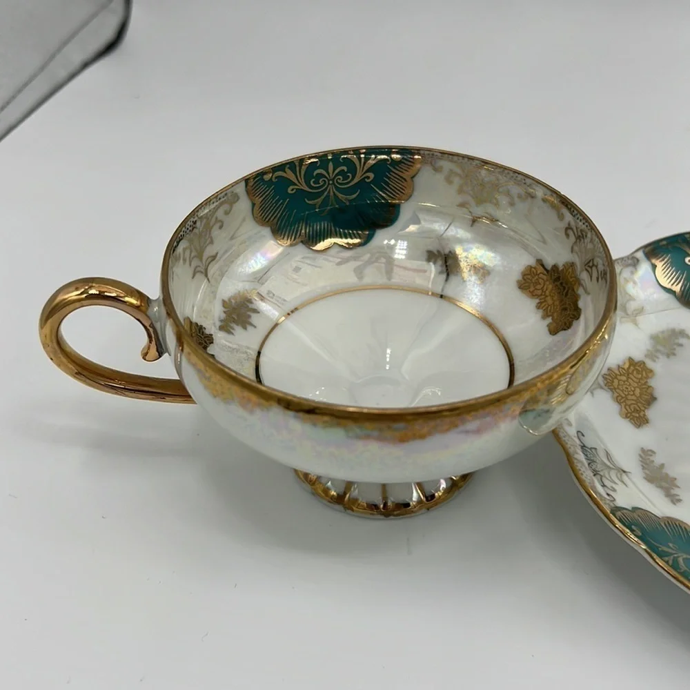 L M ROYAL HALSEY VERY FINE CHINA TEA CUP AND SAUCER SET GOLD, TEAL & IRIDESCENT